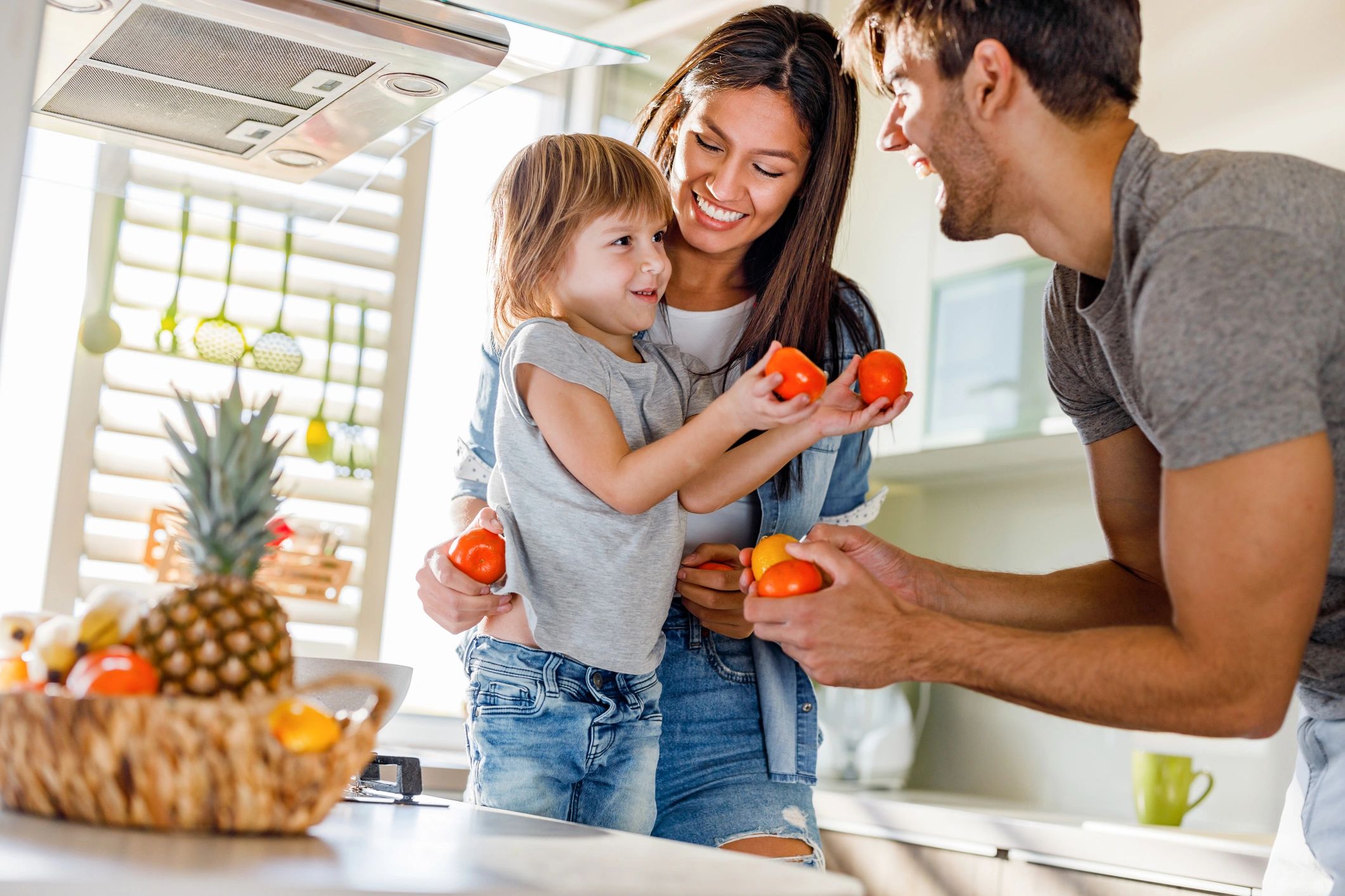 Happy family together in a kitchen