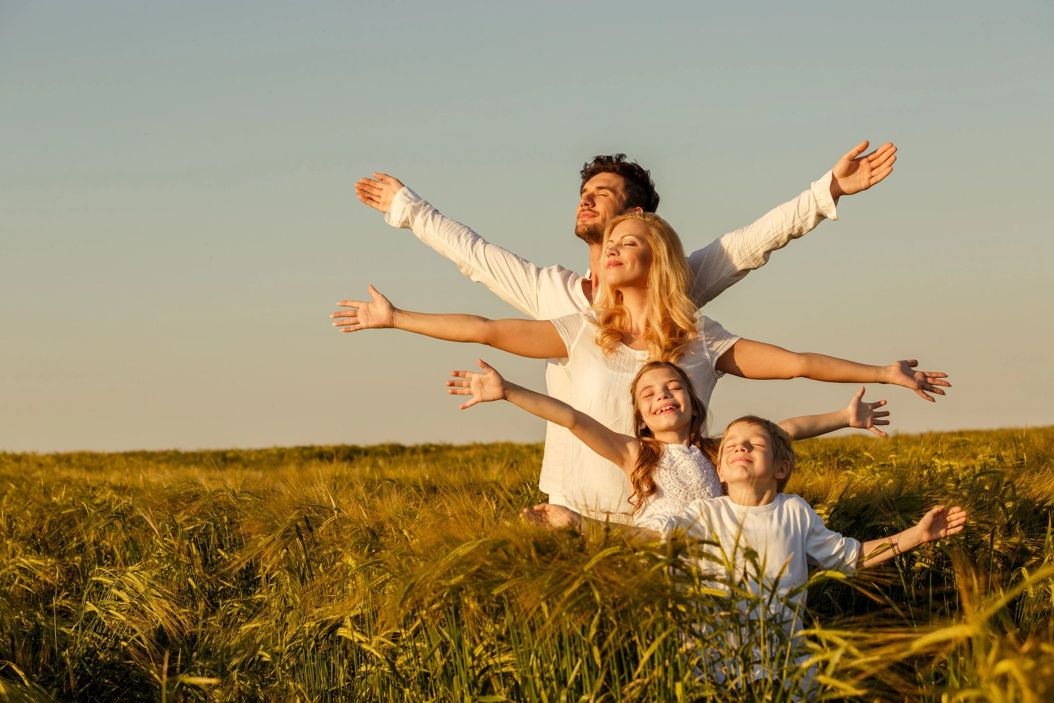 Happy family outdoors together